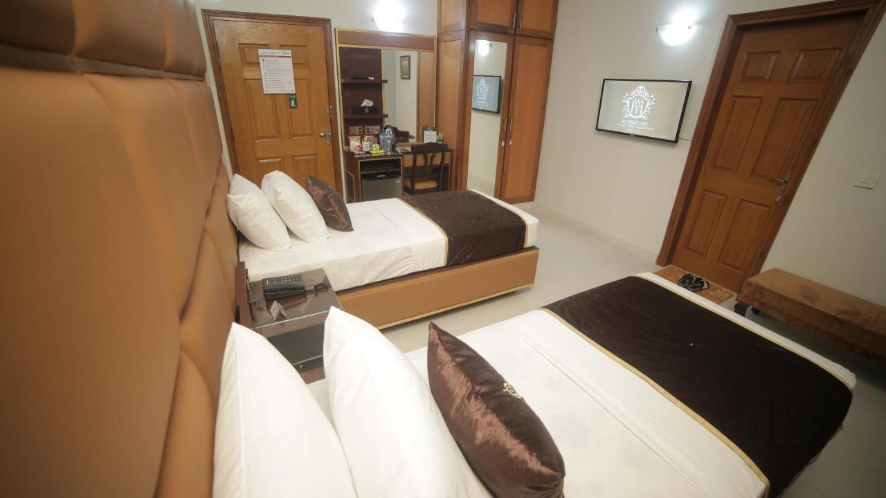 Bed and Breakfast Four Squares Karatschi Exterior foto